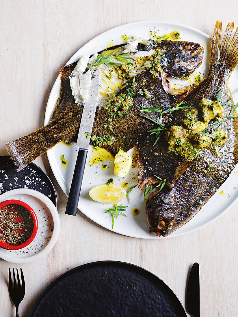 Whole-roasted flounder with caper, anchovy and herb butter