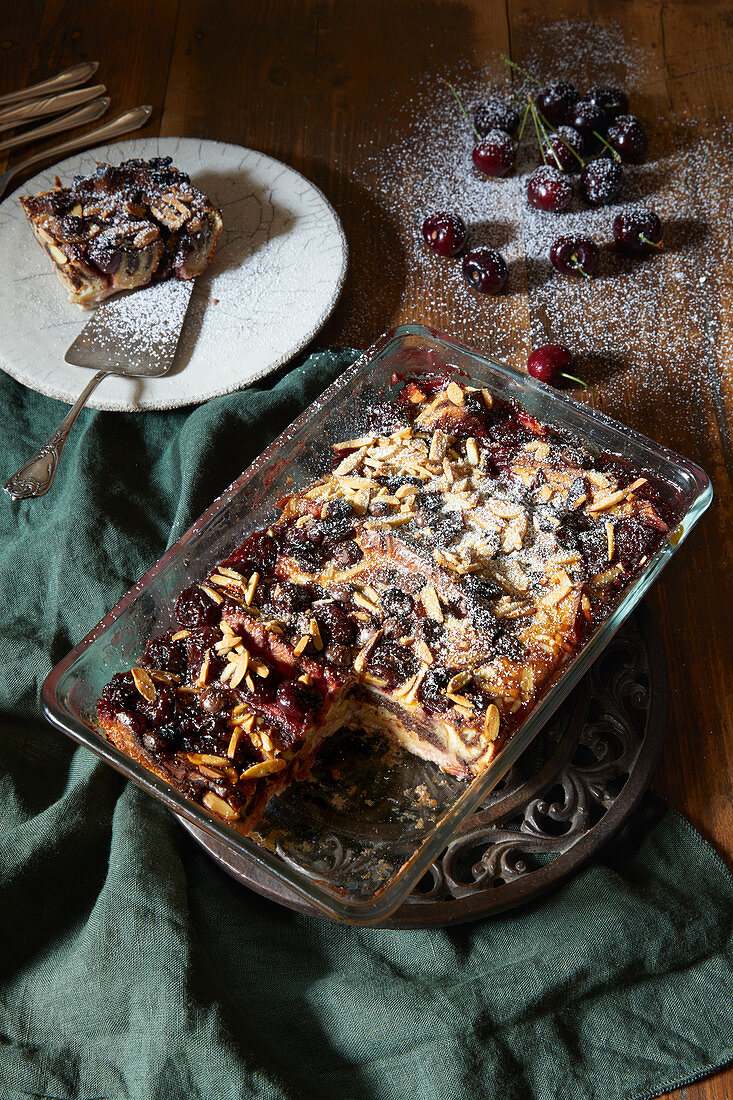 Bread pudding made with croissants, cherries, and almonds