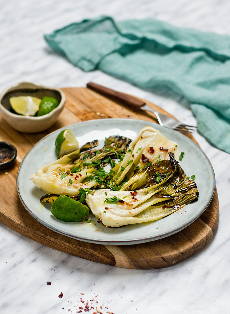 Bok choi baked with chili and herbs