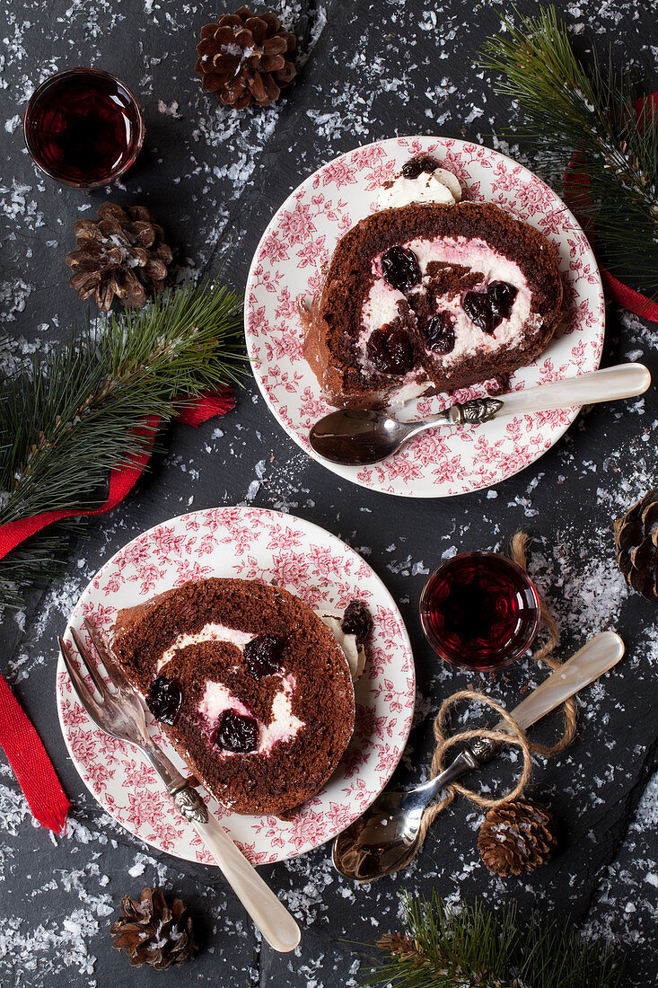 Slices of Chocolate Cherry Black Forest Yule Log Cake