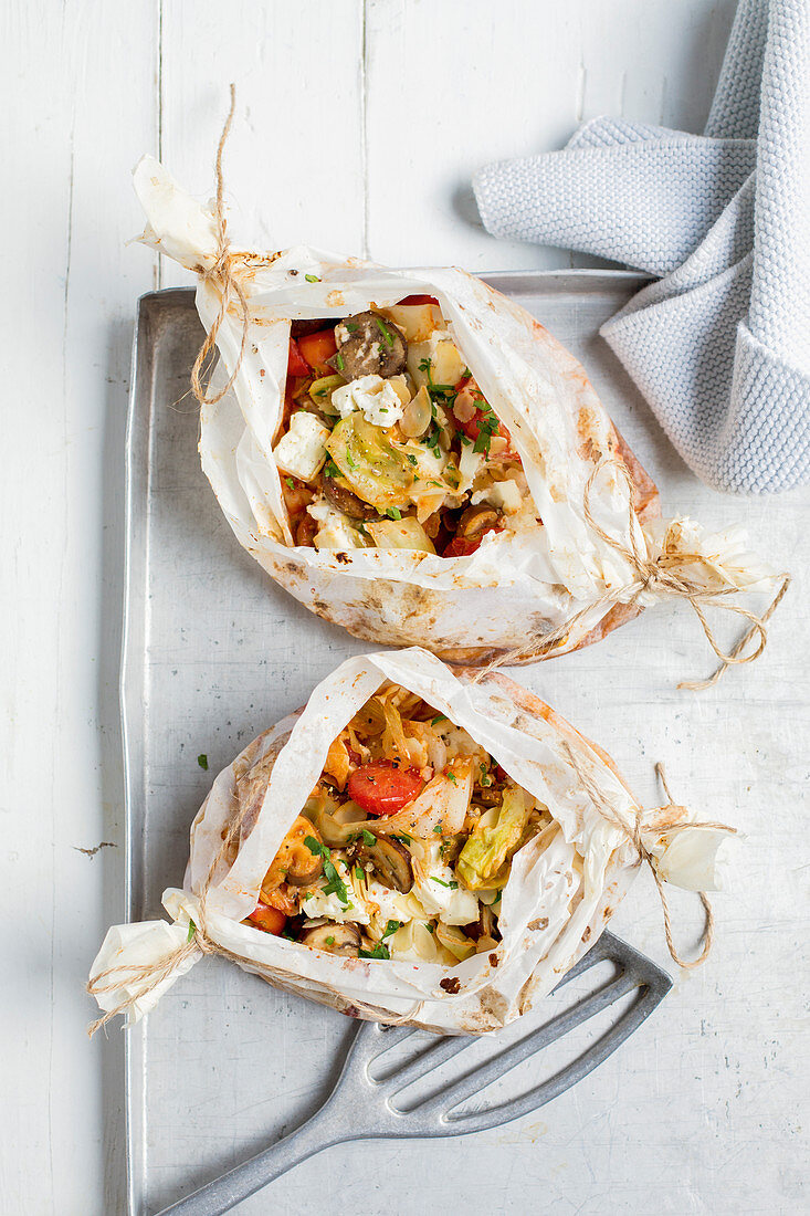 Jaroma cabbage and mushroom parcels with almonds and feta cheese