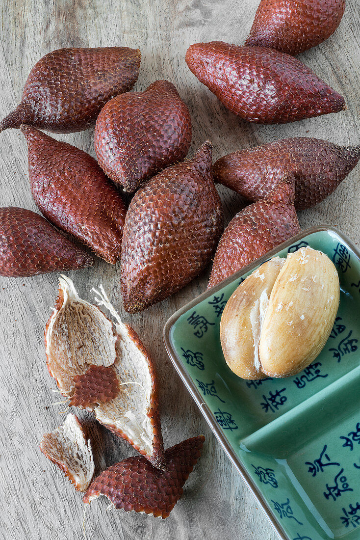 Salak on a wooden board