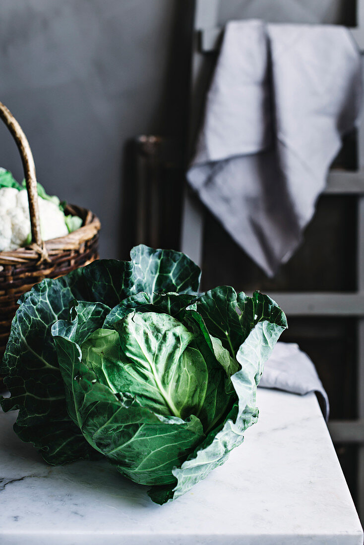Cabbage lying near basket
