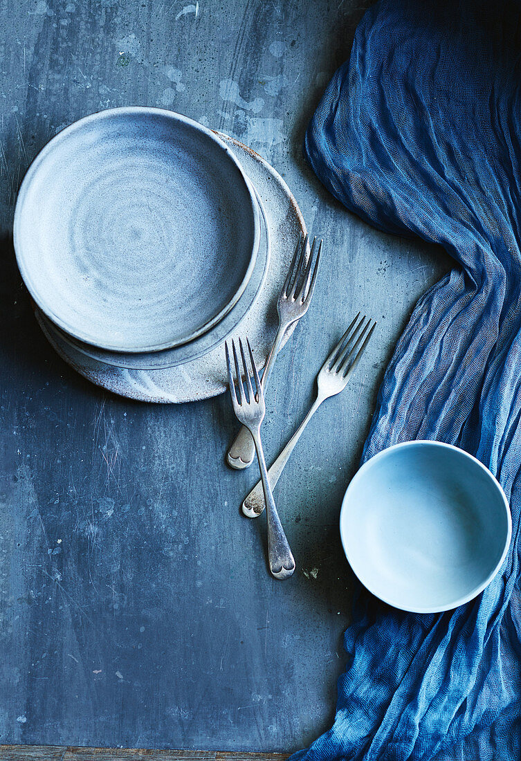 Ceramic bowls, plates and forks