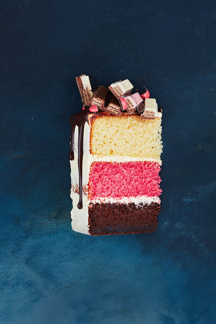 A piece of Neapolitan Kitkat layer cake