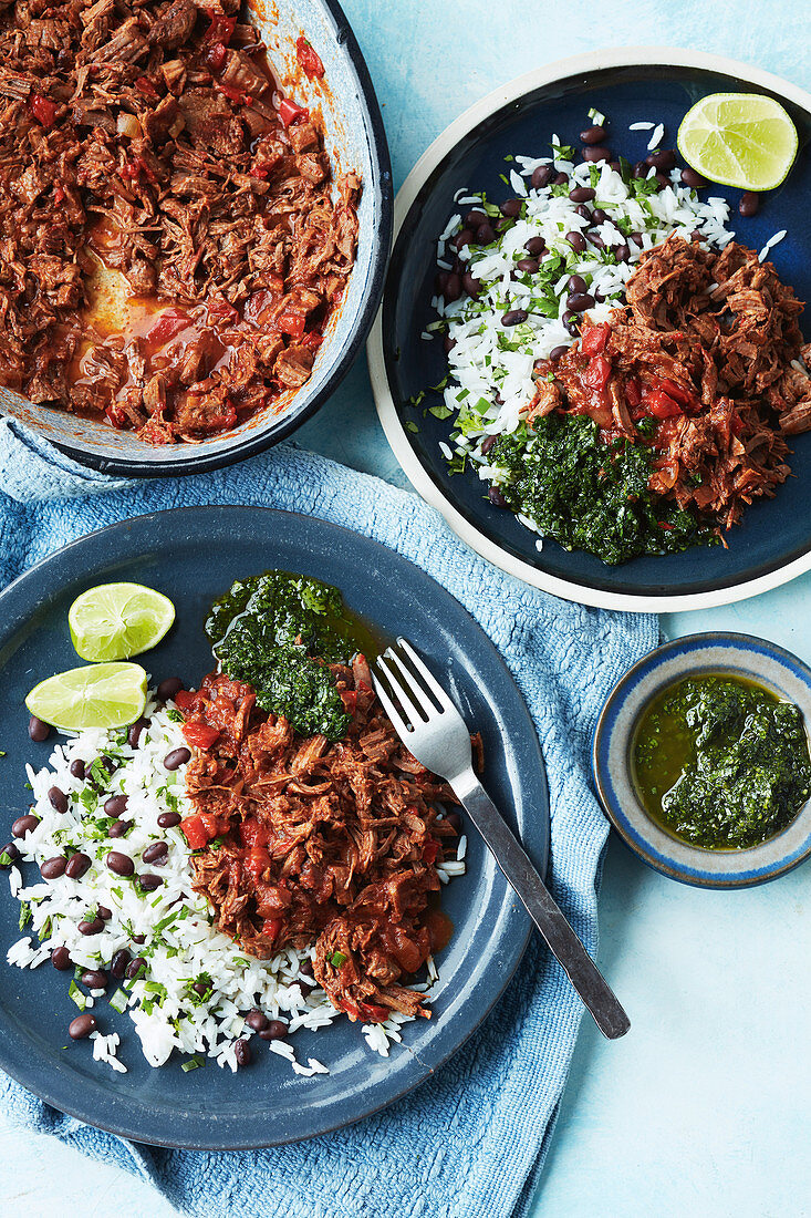 Cuban pulled beef with bean rice and chimichurri