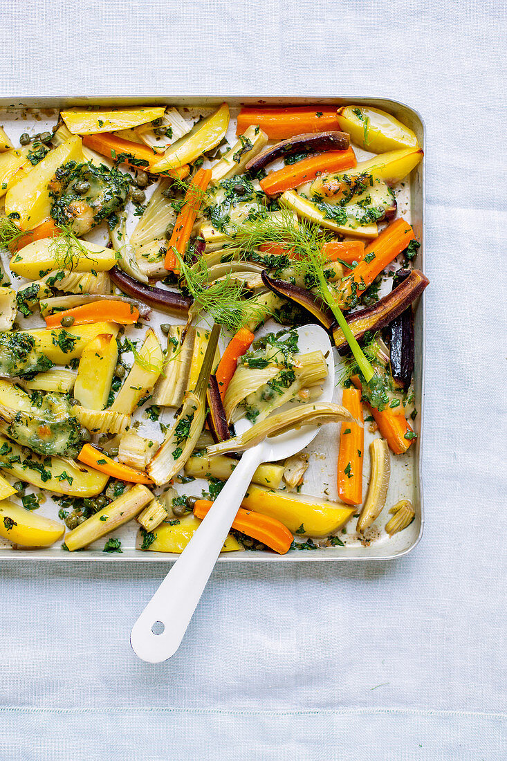 Roasted potatoes and vegetables with capers and mozzarella