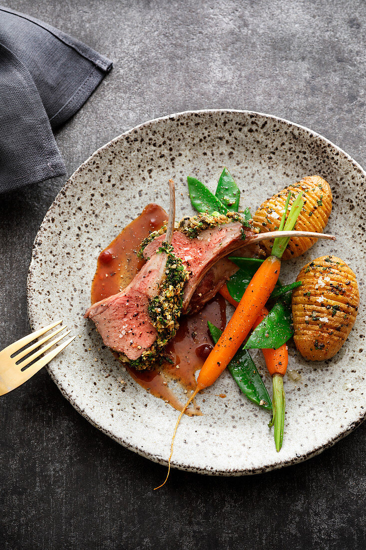 Rack of lamb with a herb crust and hasselback potatoes