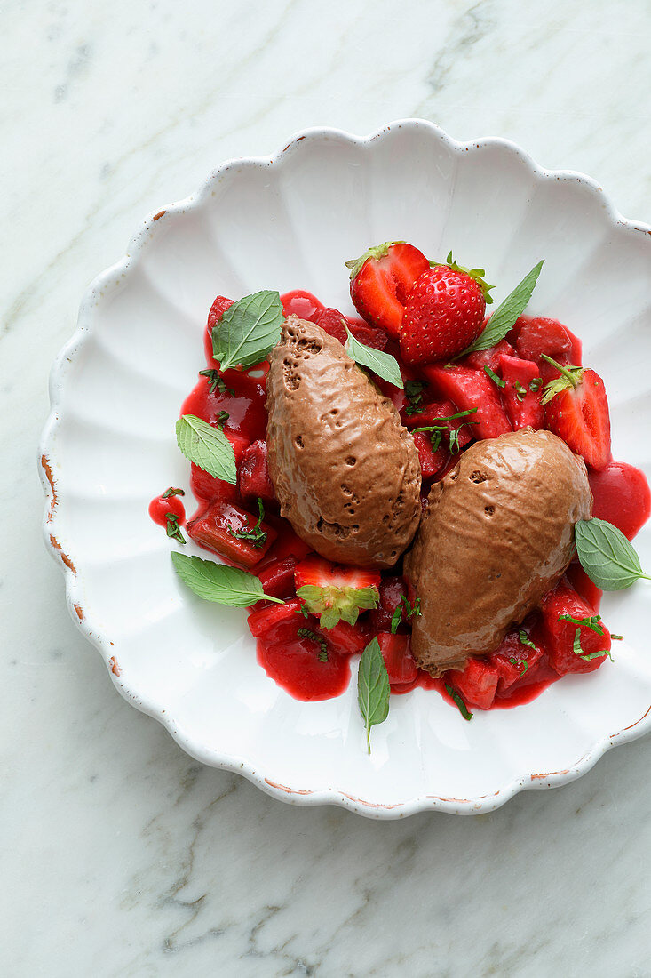 Chocolate mousse with rhubarb and strawberries
