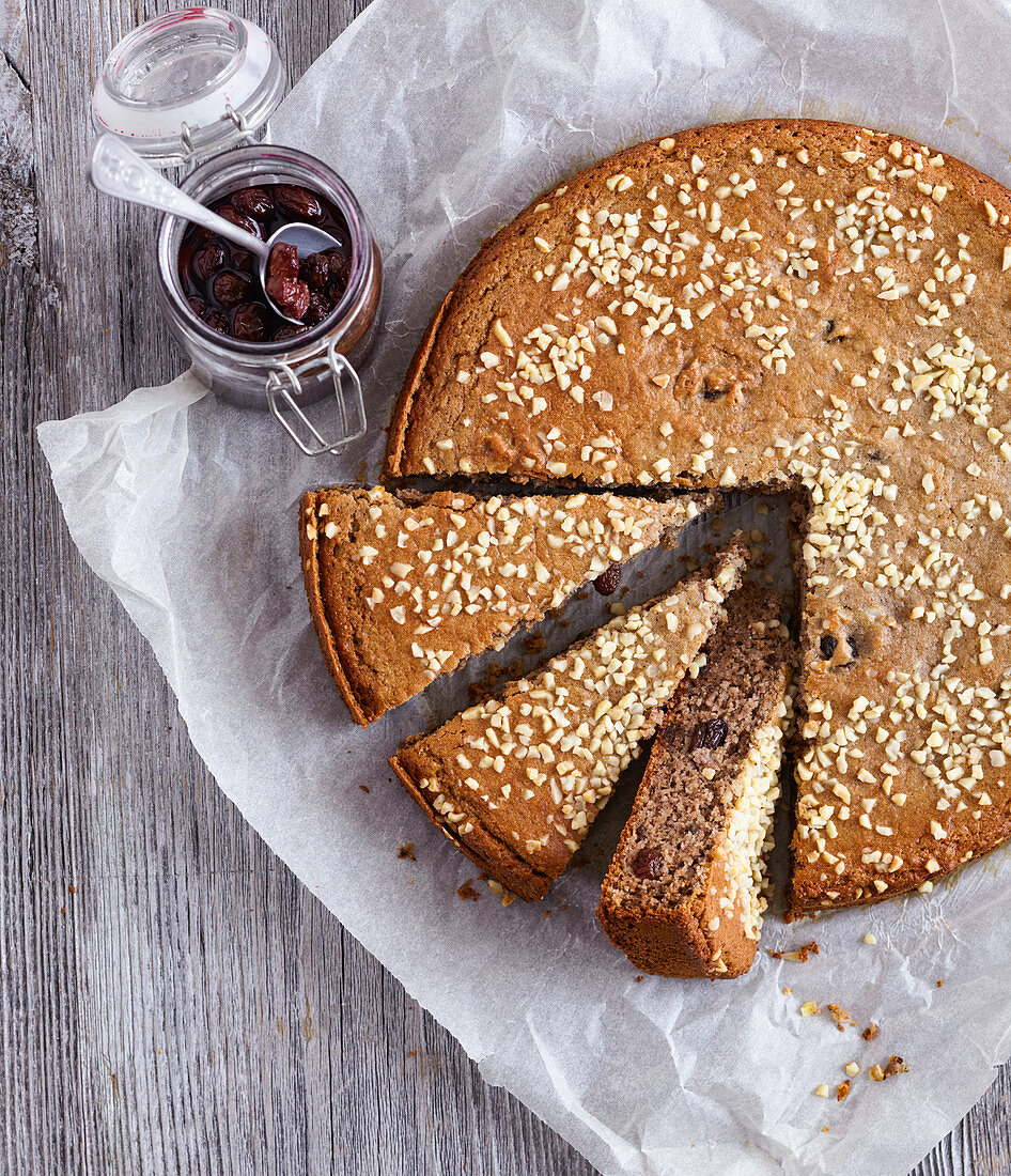 Red wine cake with almonds, nuts and raisins