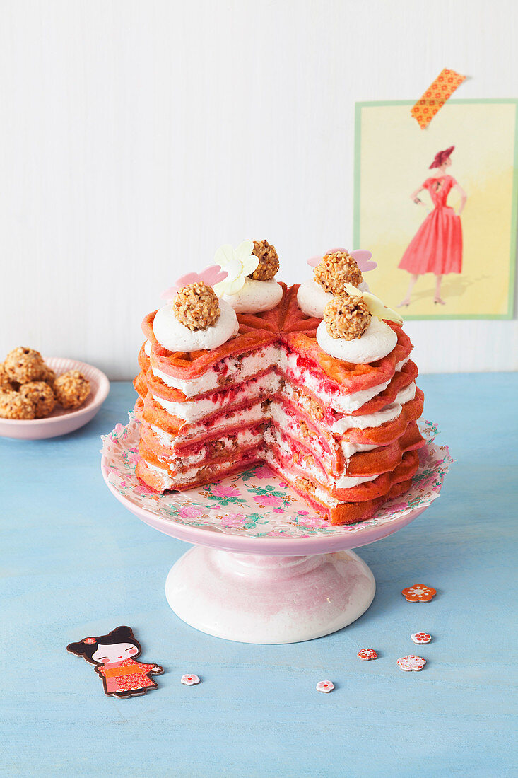 Red waffle cake with raspberry and hazelnut filling