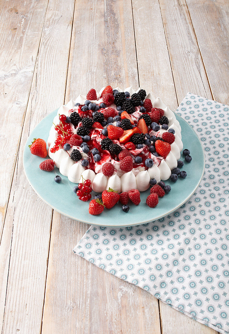 Pavlova cake with summer berries