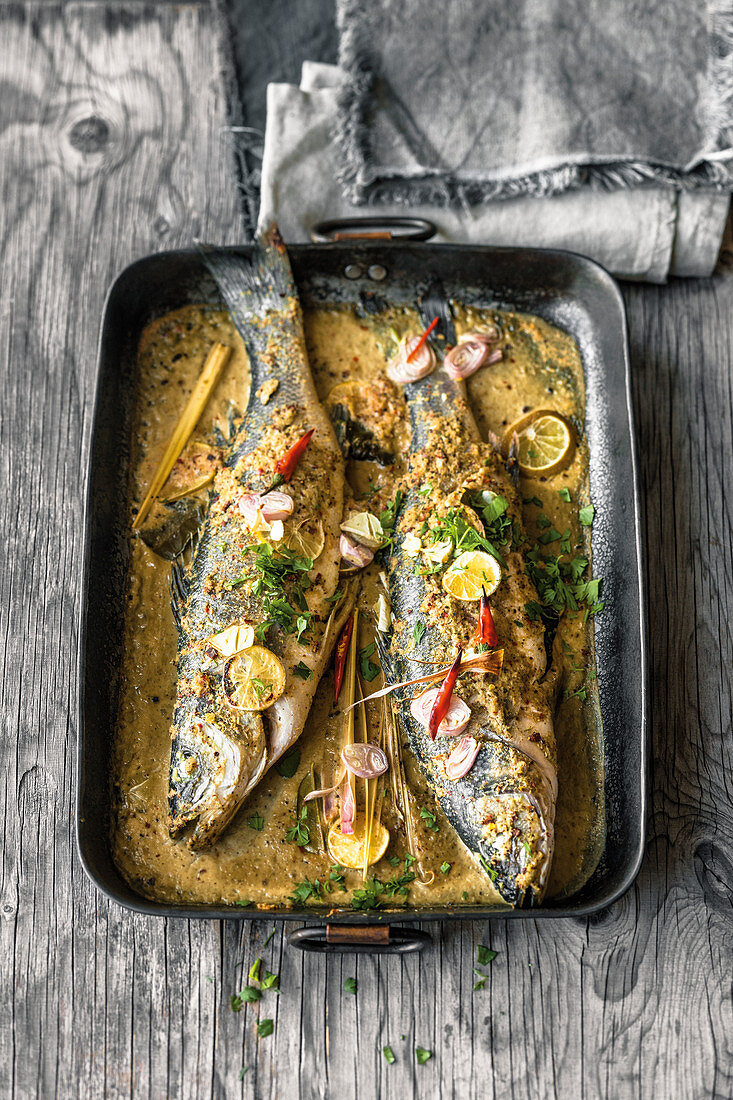 Whole sea bass in Thai curry broth