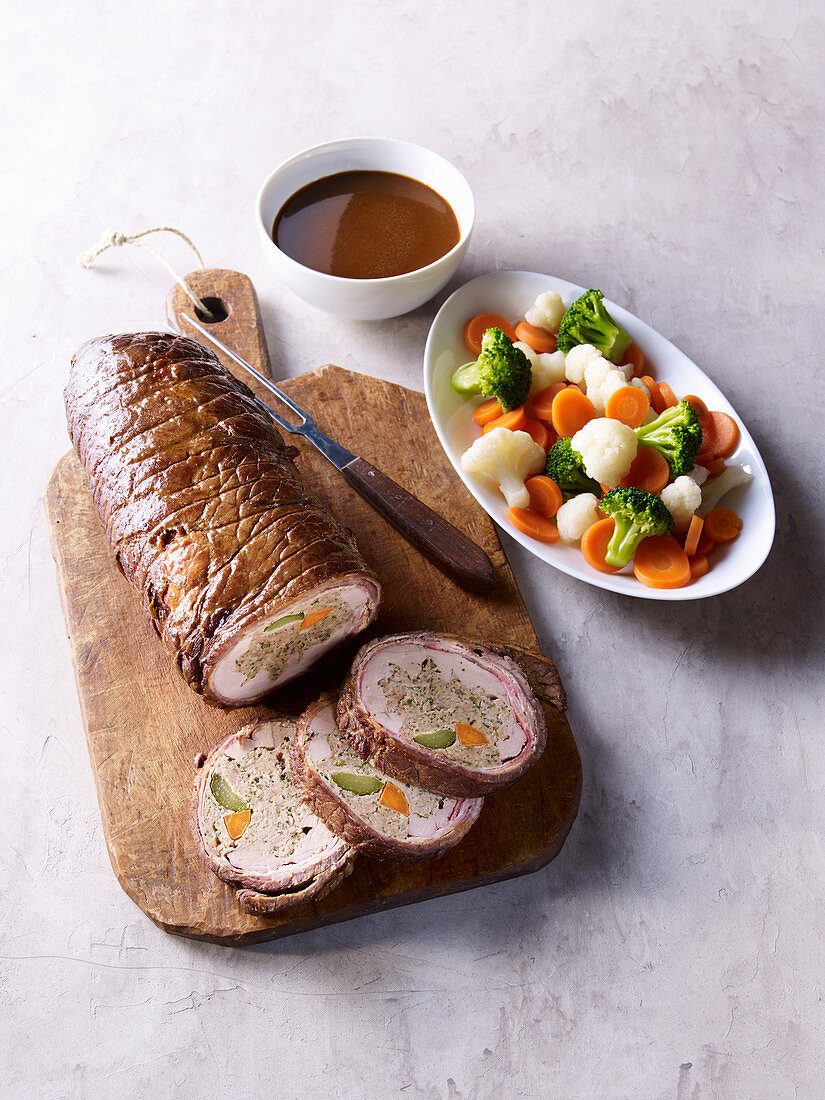 Stuffed Sunday roast made with a trio of meat