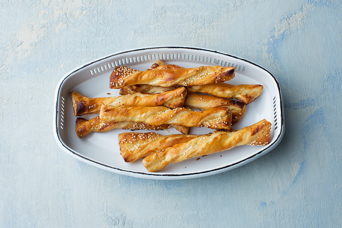 Puff pastry sticks made from pre-made pastry with sesame seeds and honey