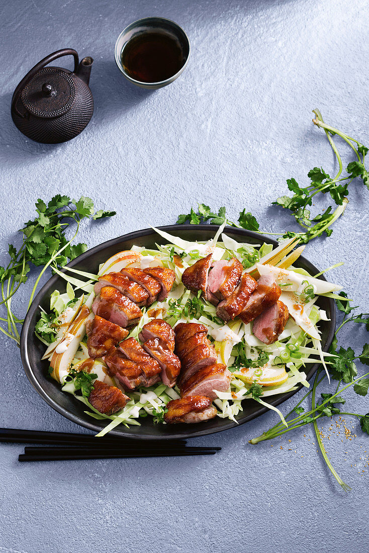 Sticky five-spice and plum duck with pear slaw (China)
