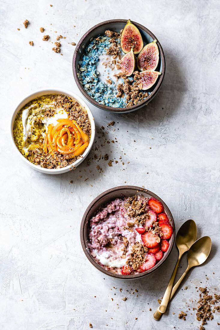 Colorful oatmeal with fruit and granola