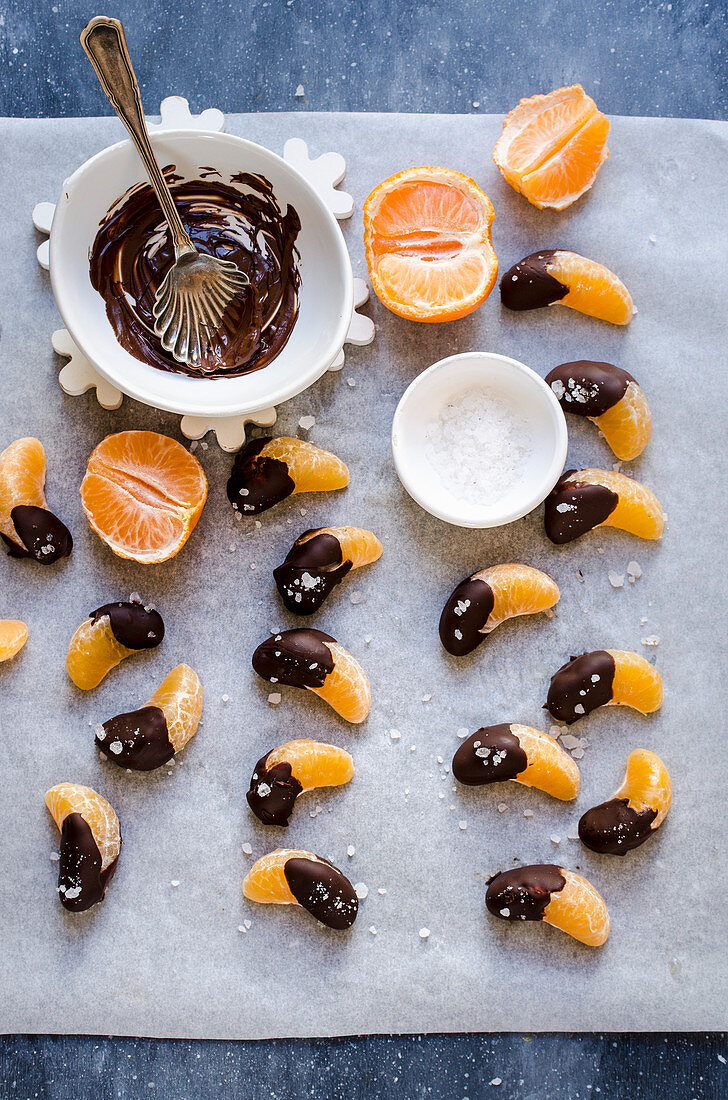 Mandarin segments dipped in salted chocolate