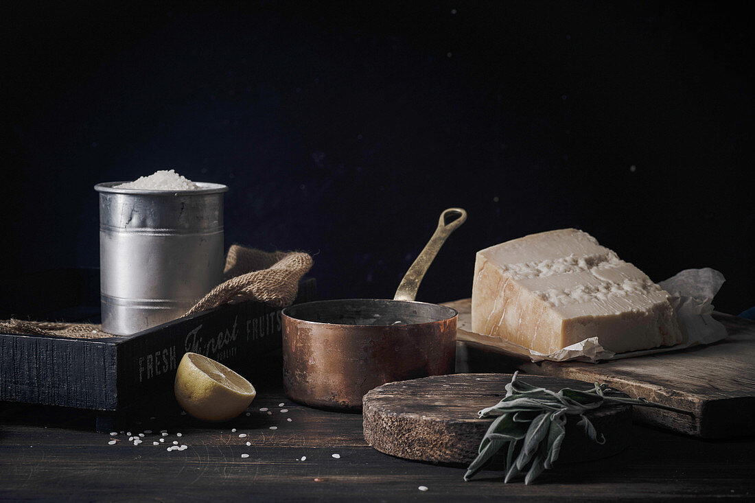 Copper pan, rice and parmesan, ingredients for risotto