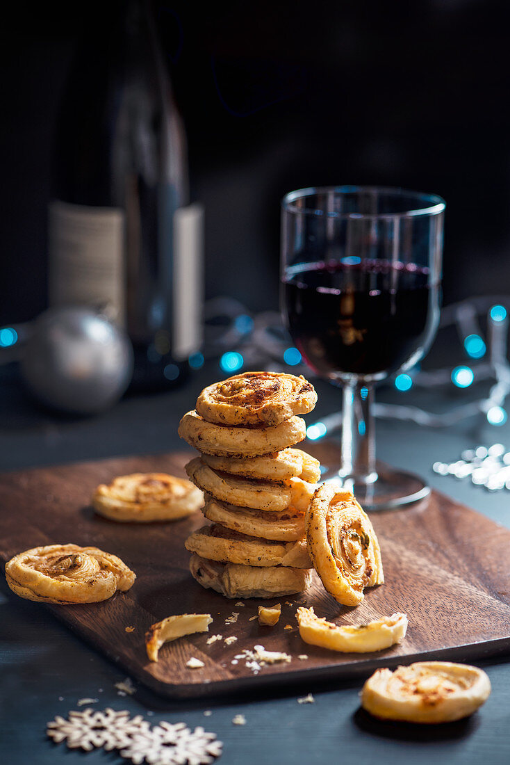 Puff pastry cheese and smoked paprika pinwheels as snack for Christmas