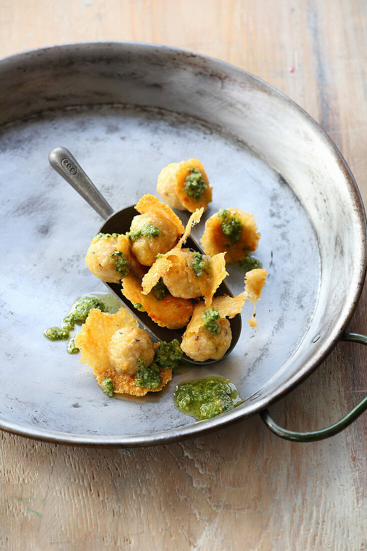 Parmesan dumplings with pesto