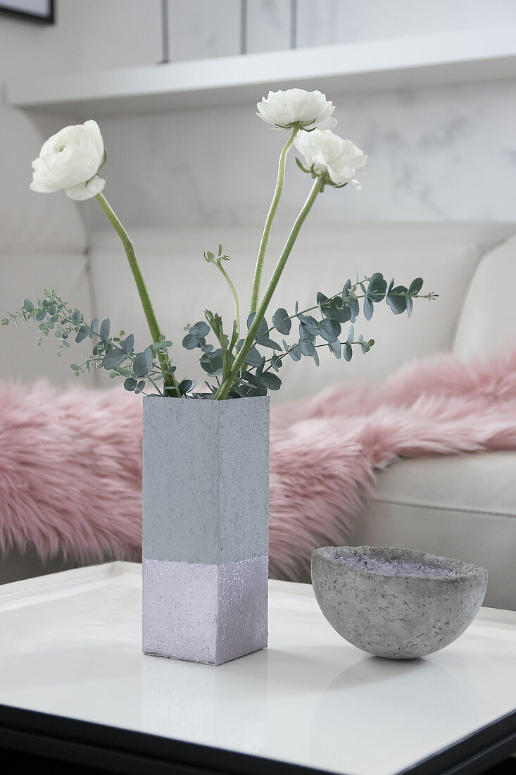 Concrete-effect vase handmade from milk carton