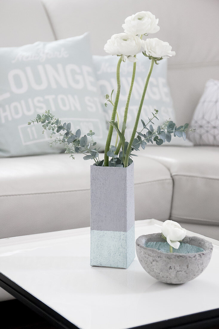 Concrete-effect vase handmade from milk carton