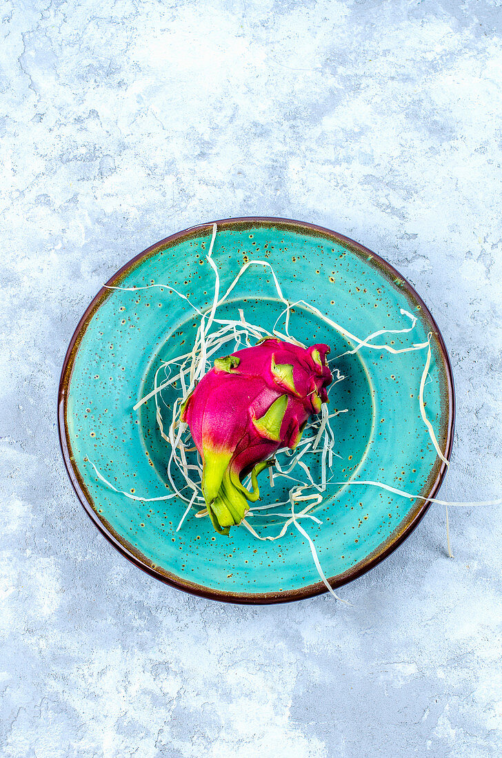 Dragon Fruit on a turquoise craft plate