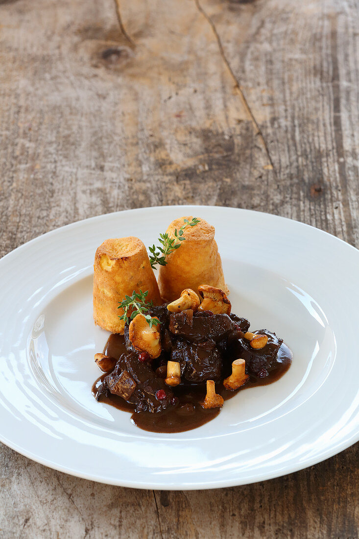 Venison goulash with chanterelle mushrooms and a potato souffle