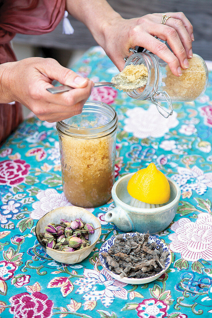 Honey, brown sugar and dried flowers for making body scrubs