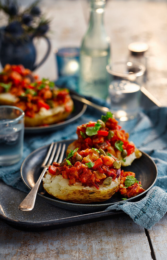 Baked potatoes with caponata