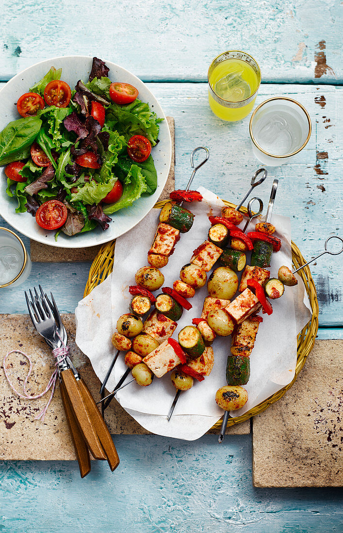 Tofu and vegetable kebabs with salad
