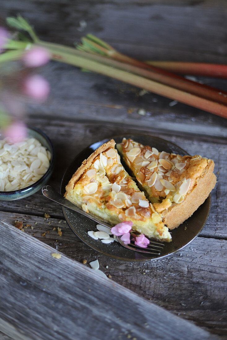 Rhubarb cake with almonds and flowers