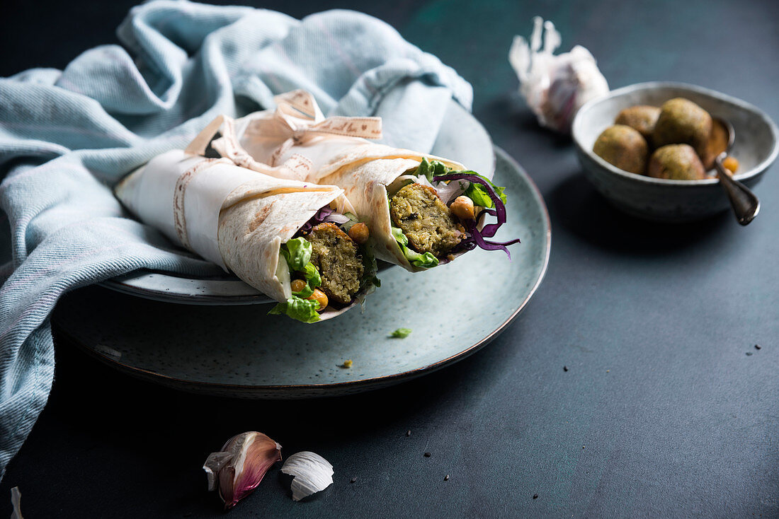 Vegan wraps with raw salad, falafel and chickpeas