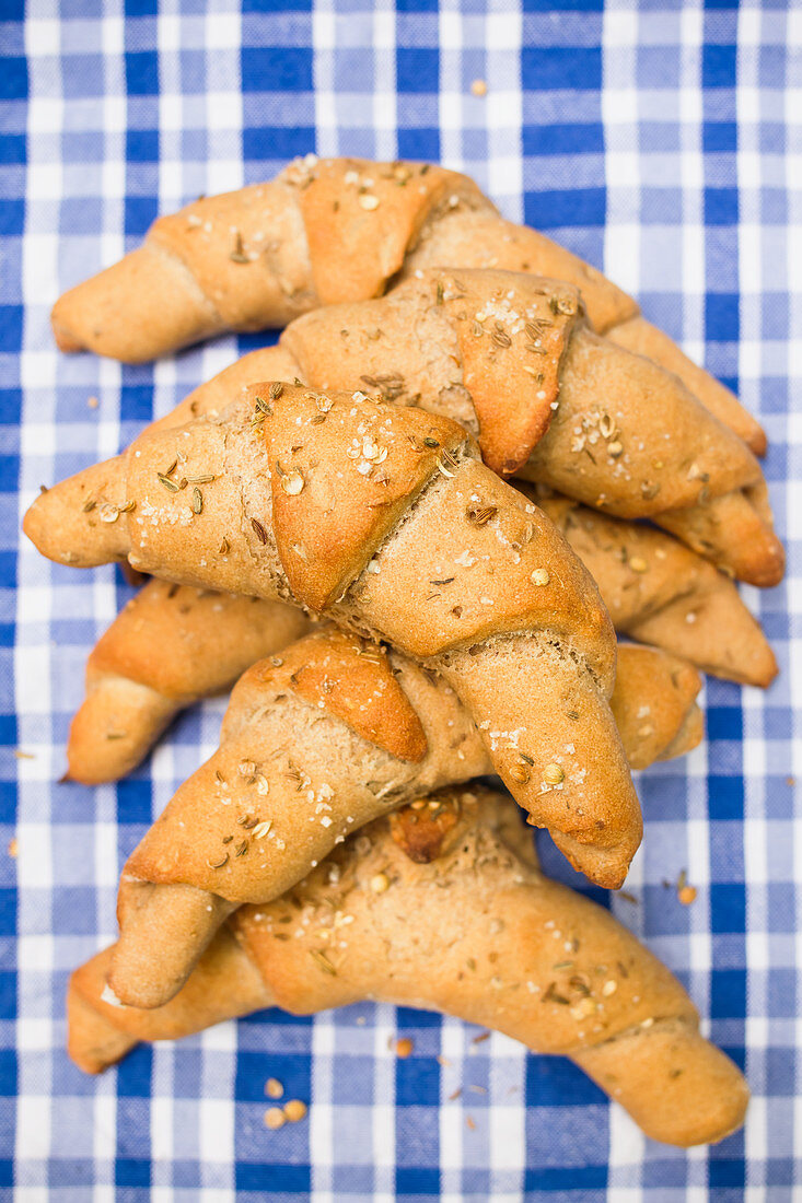 Beer pastries with spices on a checkered tablecloth