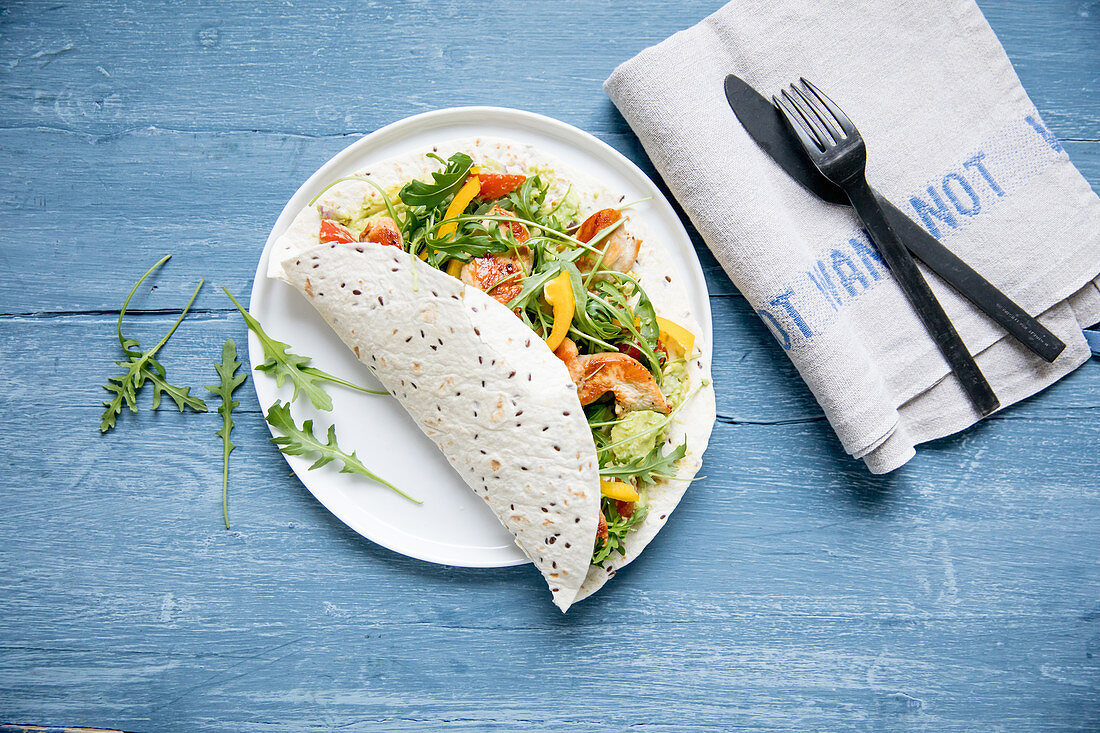 A tortilla with chicken salad