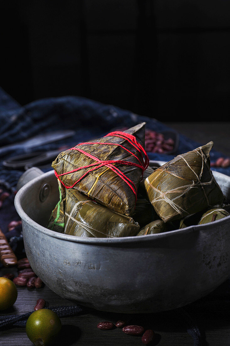 Zongzi (bamboo leaves filled with sticky rice, China)