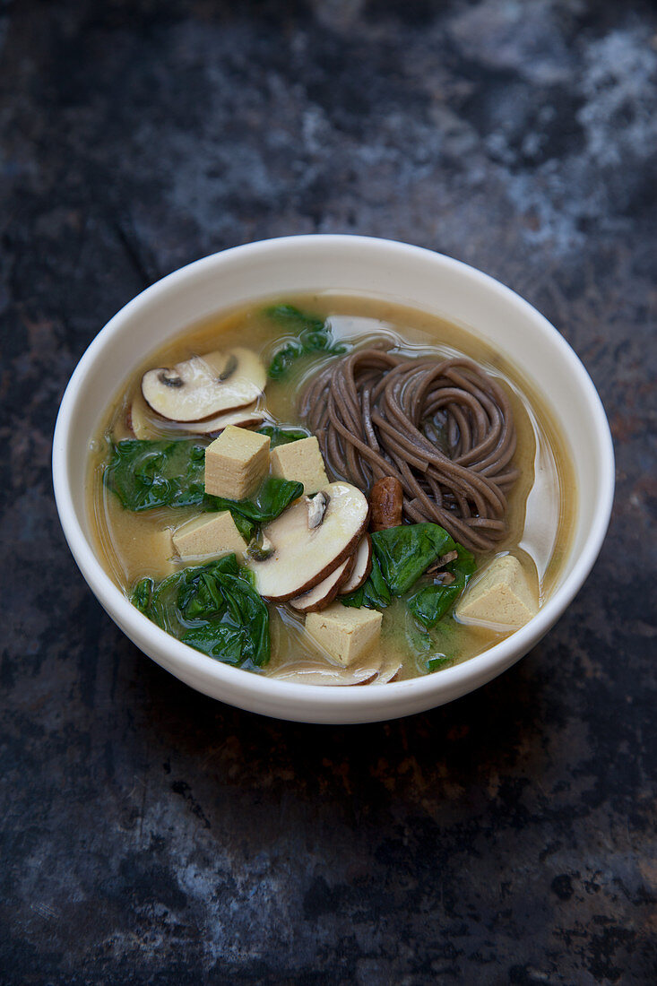 Miso soup with buckwheat noodles, spinach and tofu (Japan)