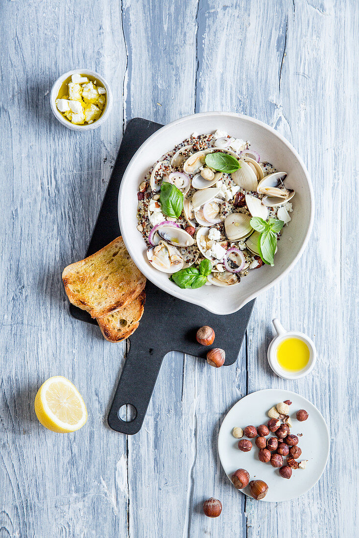 Quinoa salad with clams and hazelnuts