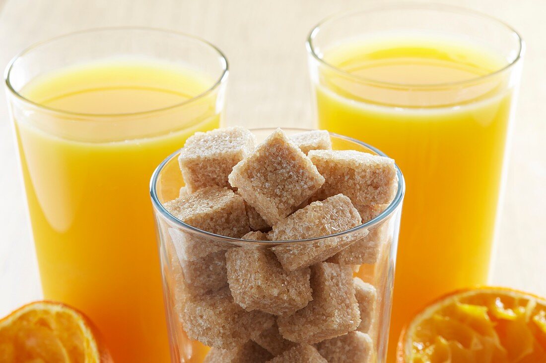 Freshly squeezed orange juice and sugar cubes