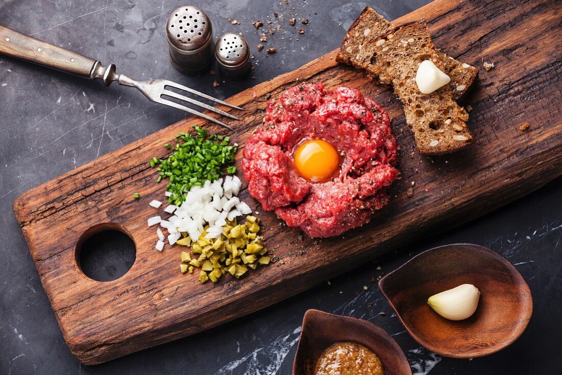 Beef tartare with pickled cucumber and … – License image – 12262112 ❘ Image  Professionals
