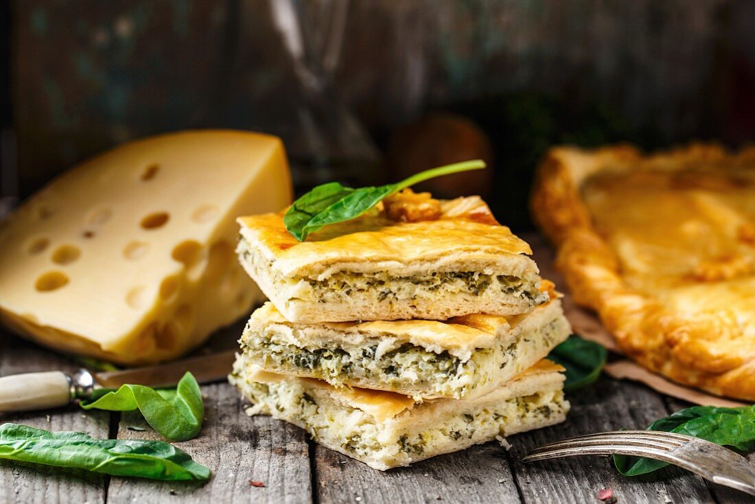 Delicious homemade pie stuffed with cheese and spinach