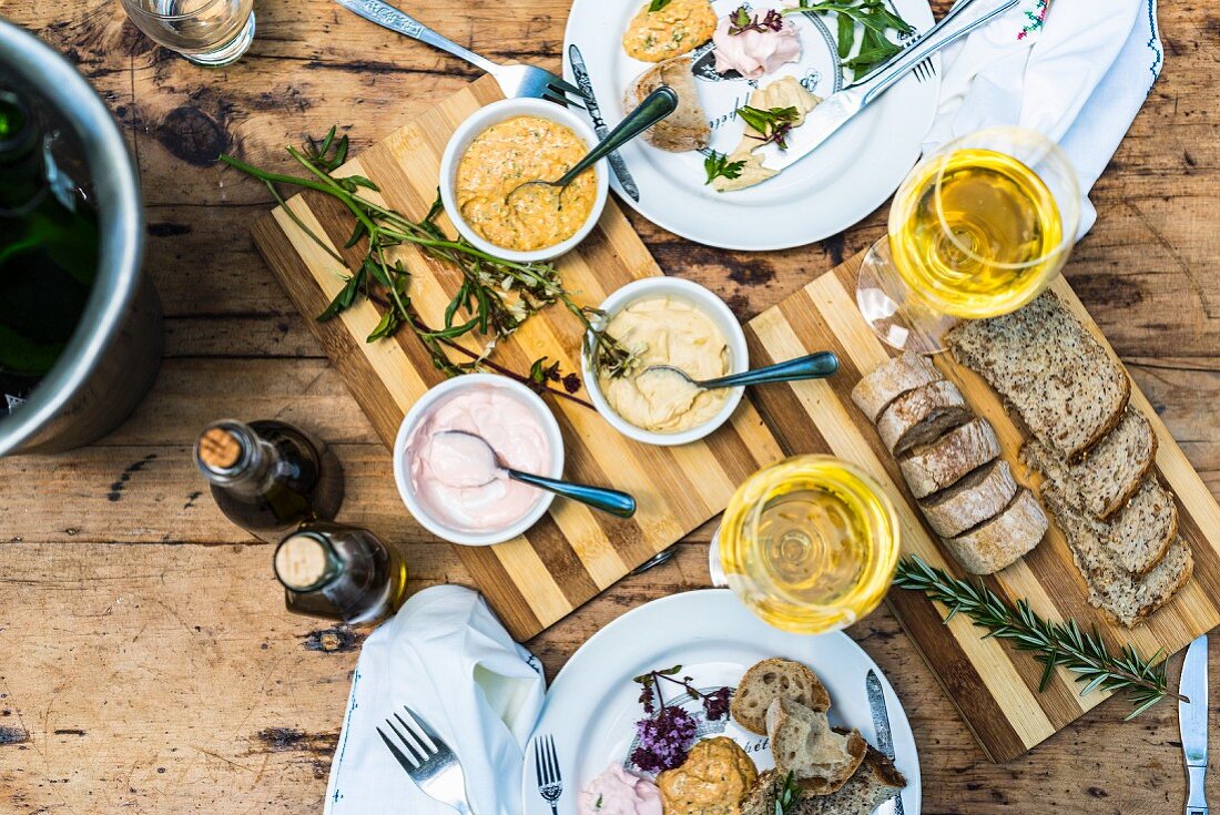 Mezze and wine on a wooden table