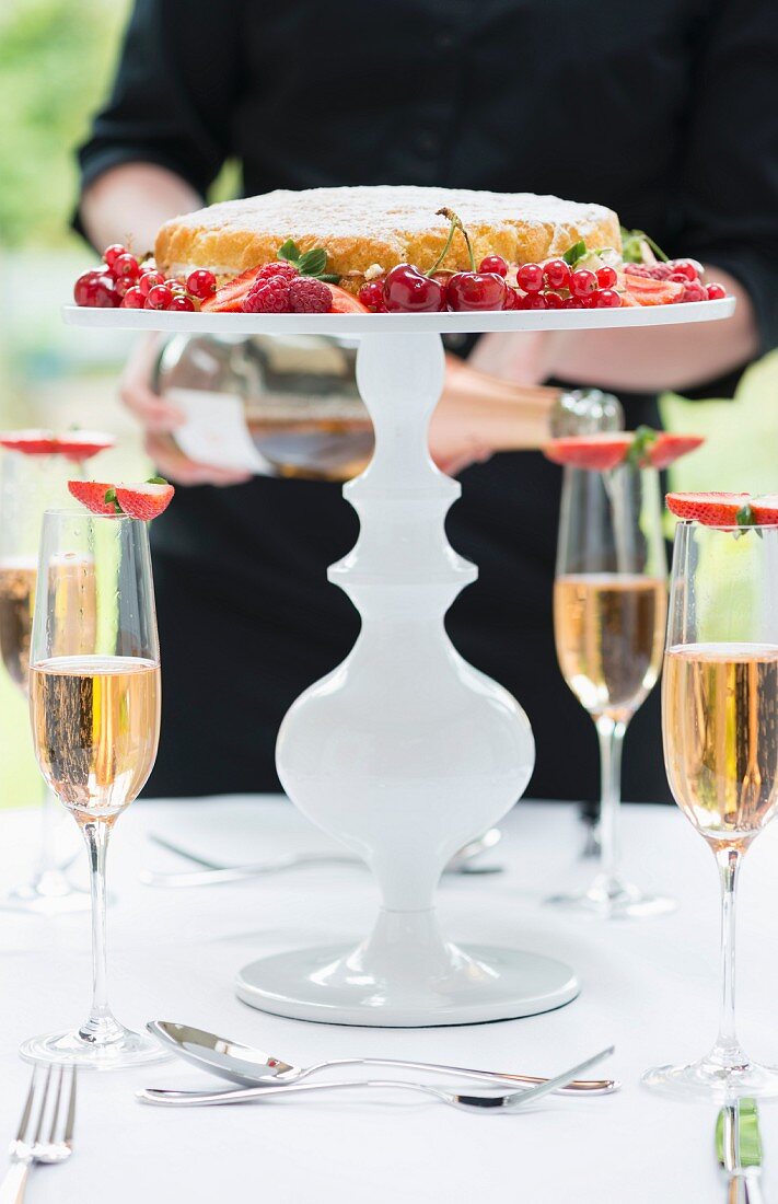 Victoria sponge cake on a cake stand