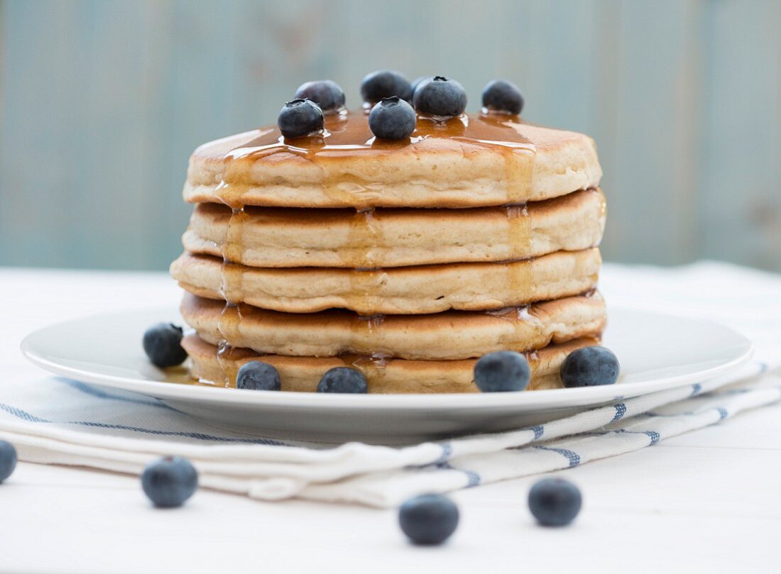 Pancakes, blueberries and honey