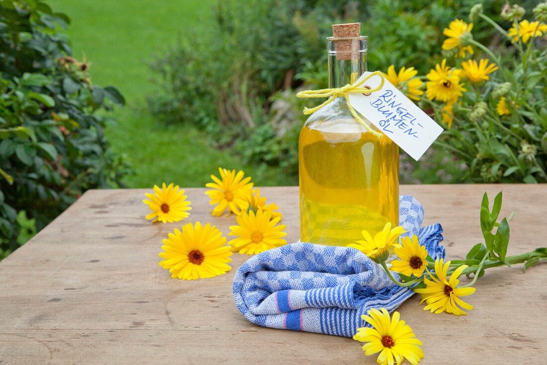 Homemade marigold oil in a bottle for gifting