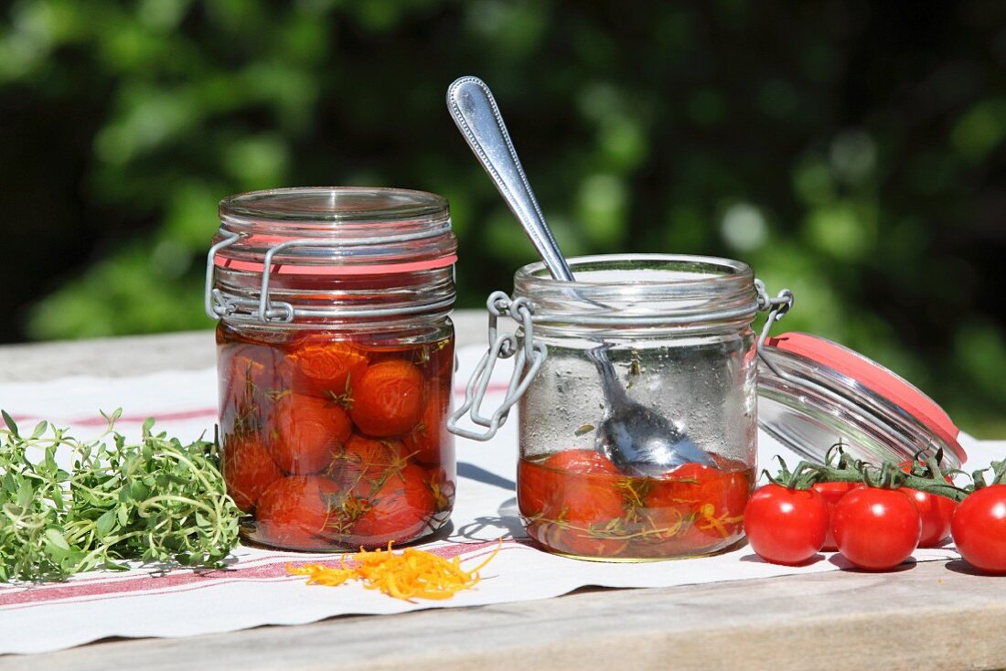 Cherry tomatoes in preserving jars