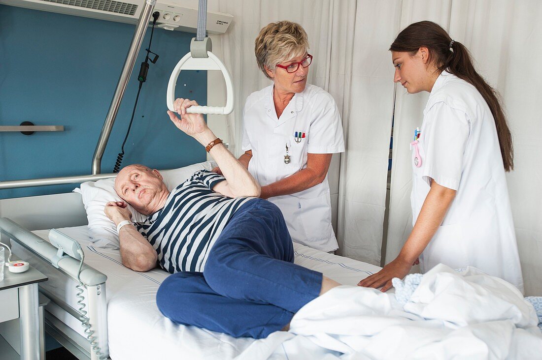 Nurses assisting Patient