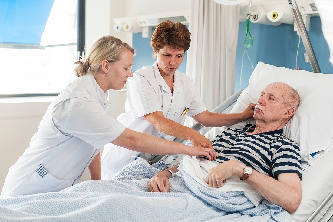 Patient with nurses