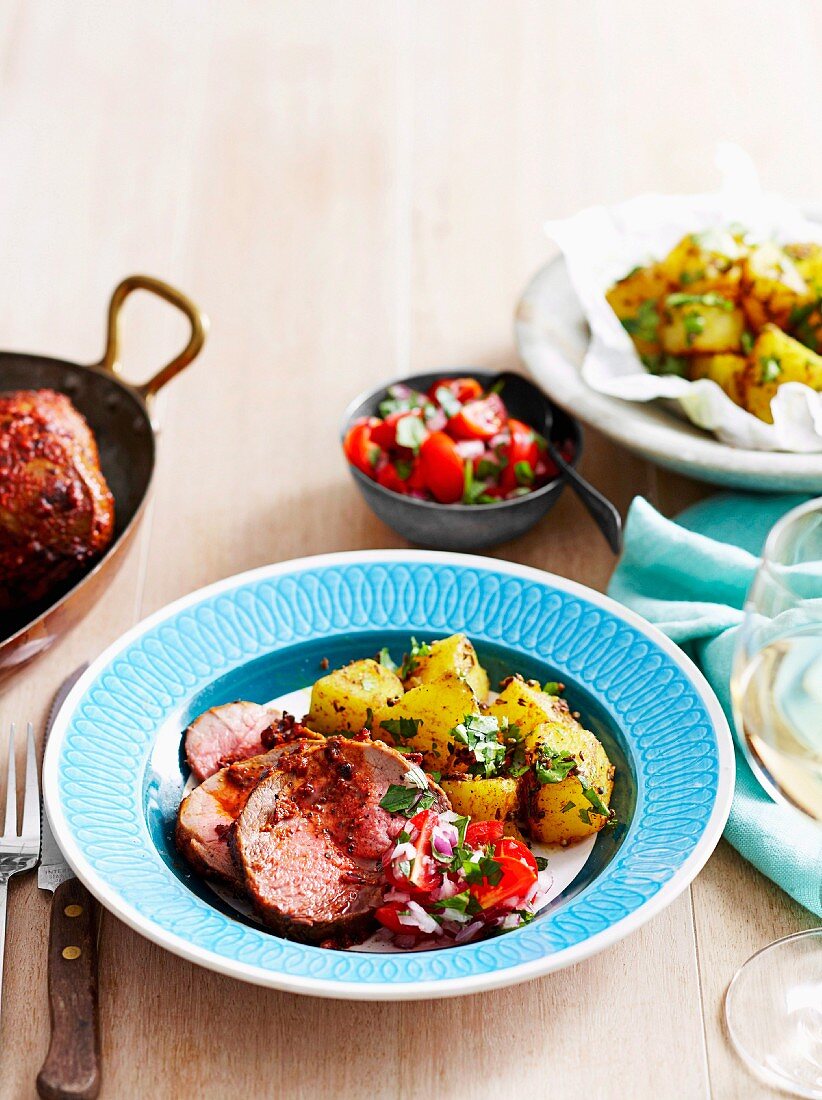 Indian Tandoori roast lamb with masala potatoes